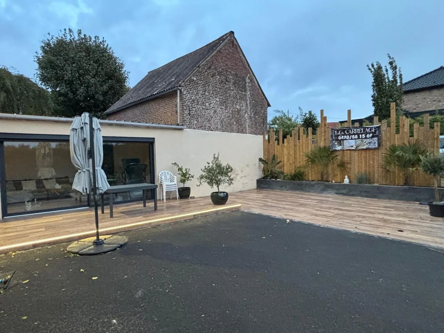 Terrasse bois avec lambourdes et lames en pin traité, exemple de rendu LG Construction